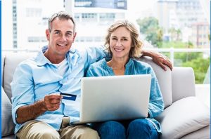 Comfortable Couple Sitting in a couch